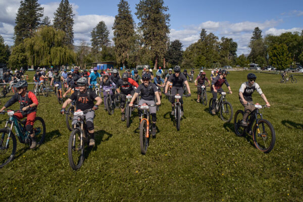 mountain bikers riding out of Manitou Park in Naramata