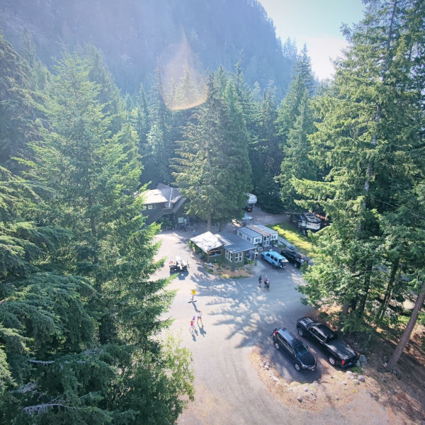 MTN Fun Basecamp main building and parking area, surrounded by forest