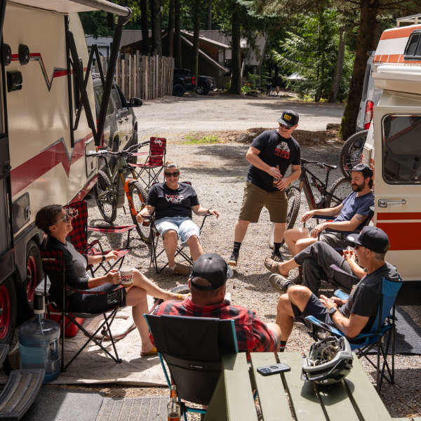 People hanging out at a campsite